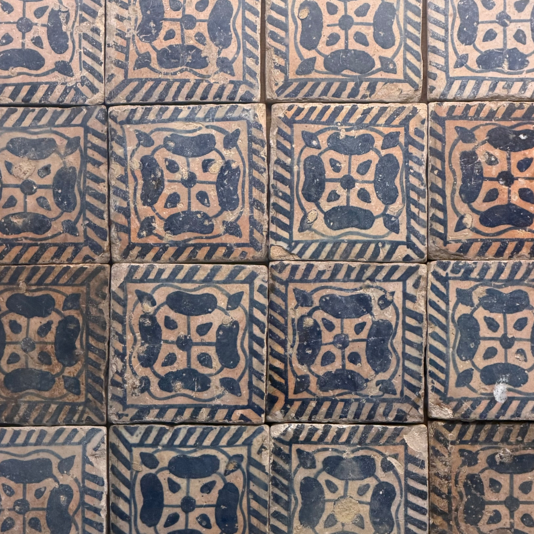 Hand painted square tiles.