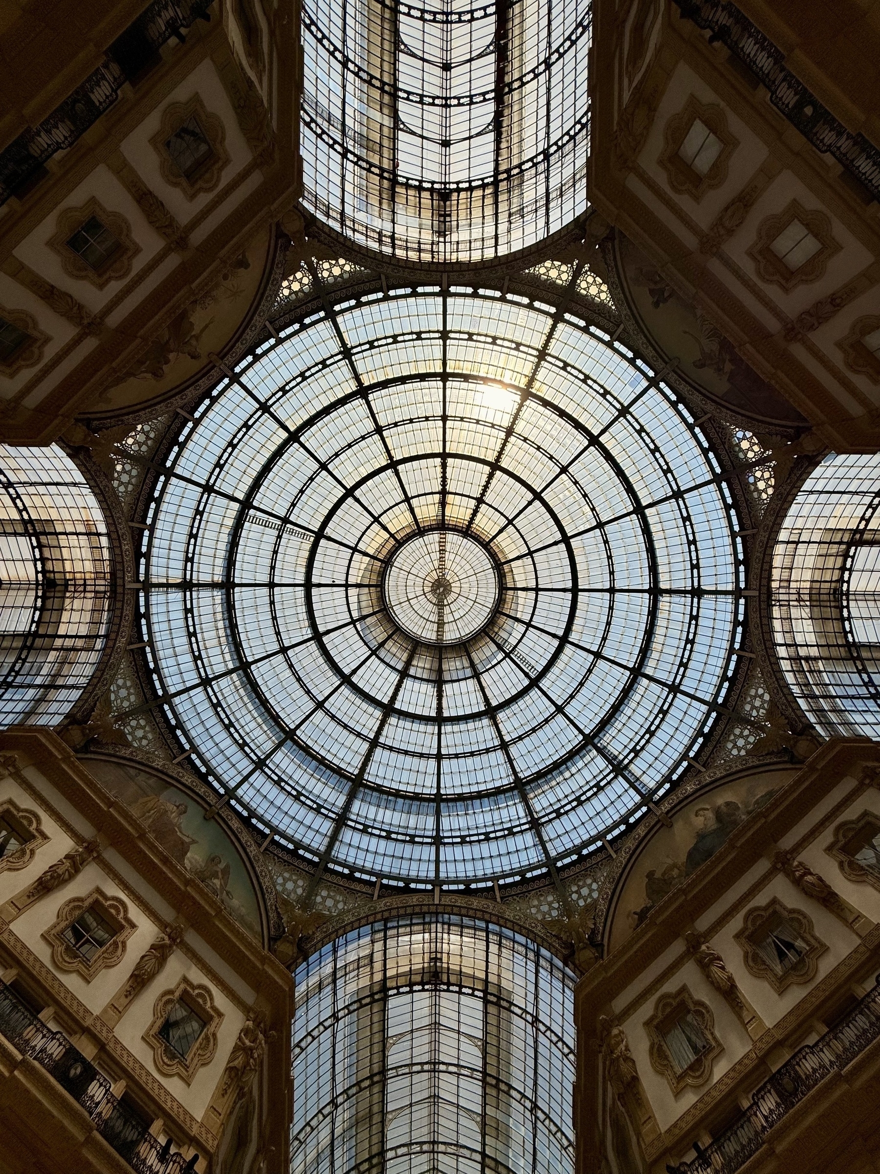 Looking directly up at a glass dome.