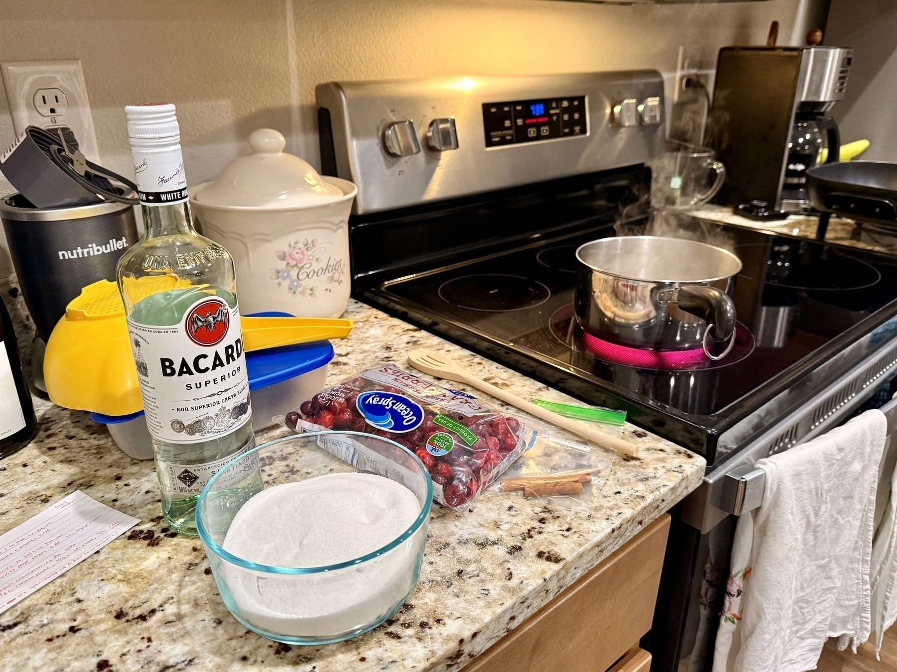 Sugar, cranberries, light rum. Pot on the boil