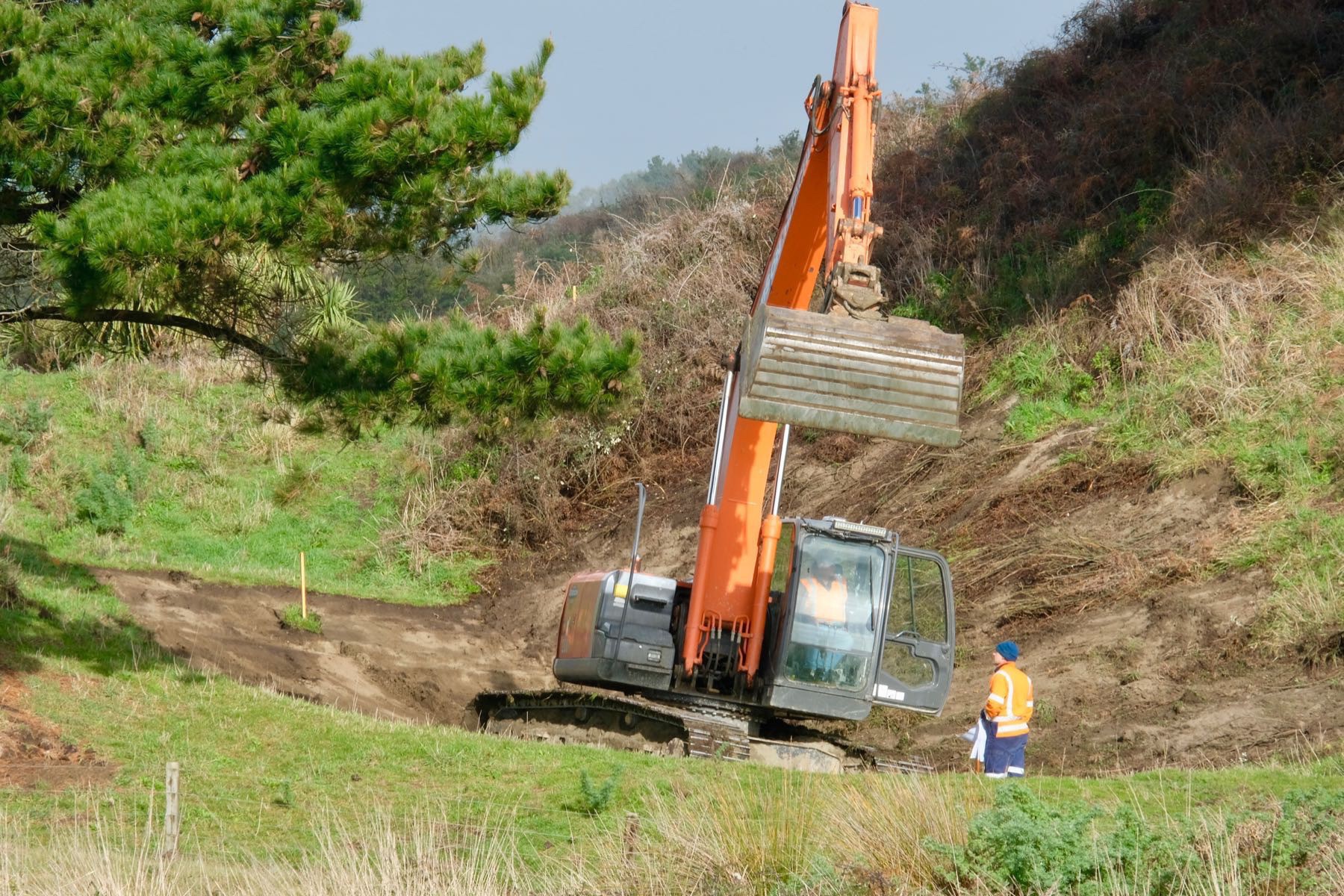 Closeup of digger excavation work that has just started. 