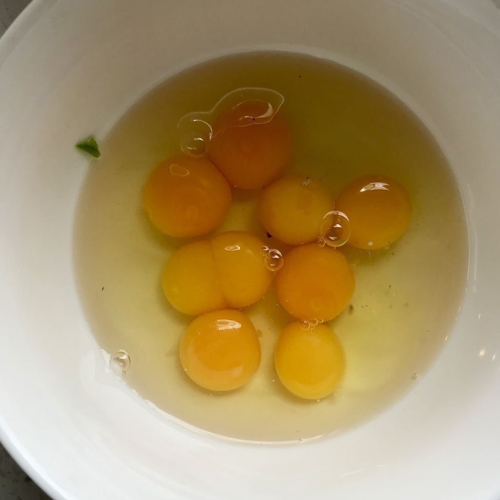 Bowl of shelled eggs, including the double-yolker. 