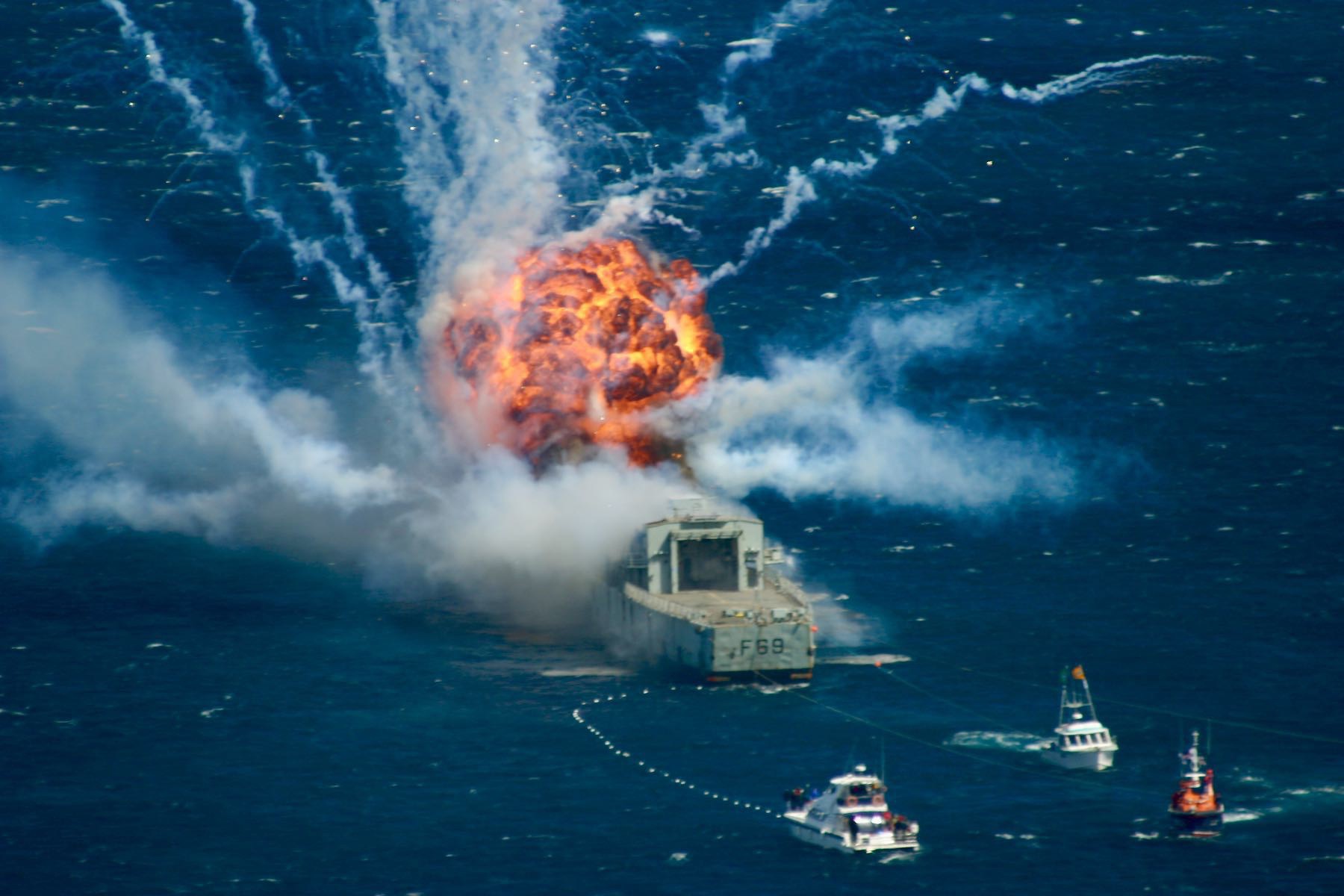 A huge fireball at the rear of Navy frigate Wellington.