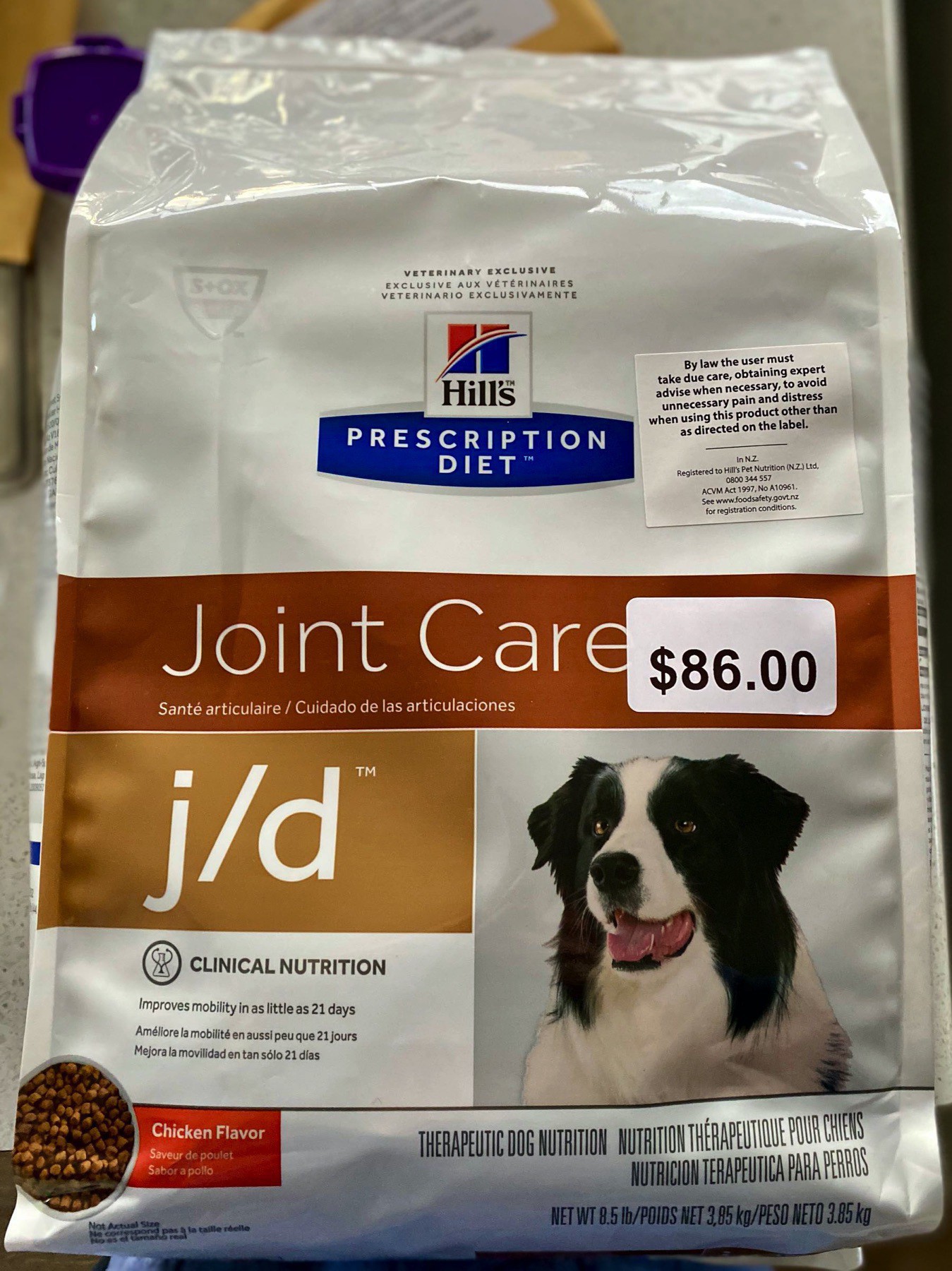 Bag of dog biscuits with $86 price tag. 