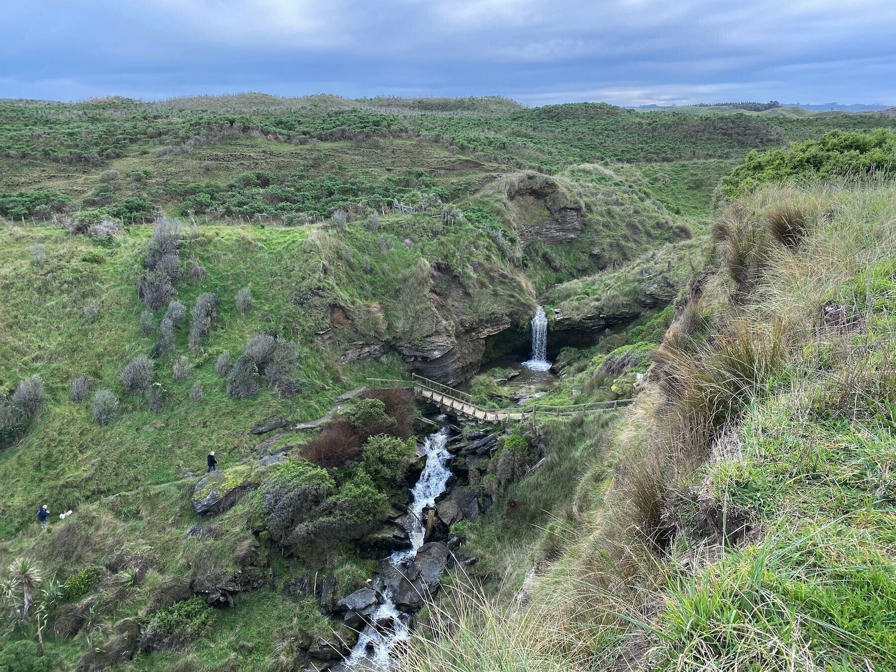 Looking down from the carpark to the track to the beach, with waterfall visible. 