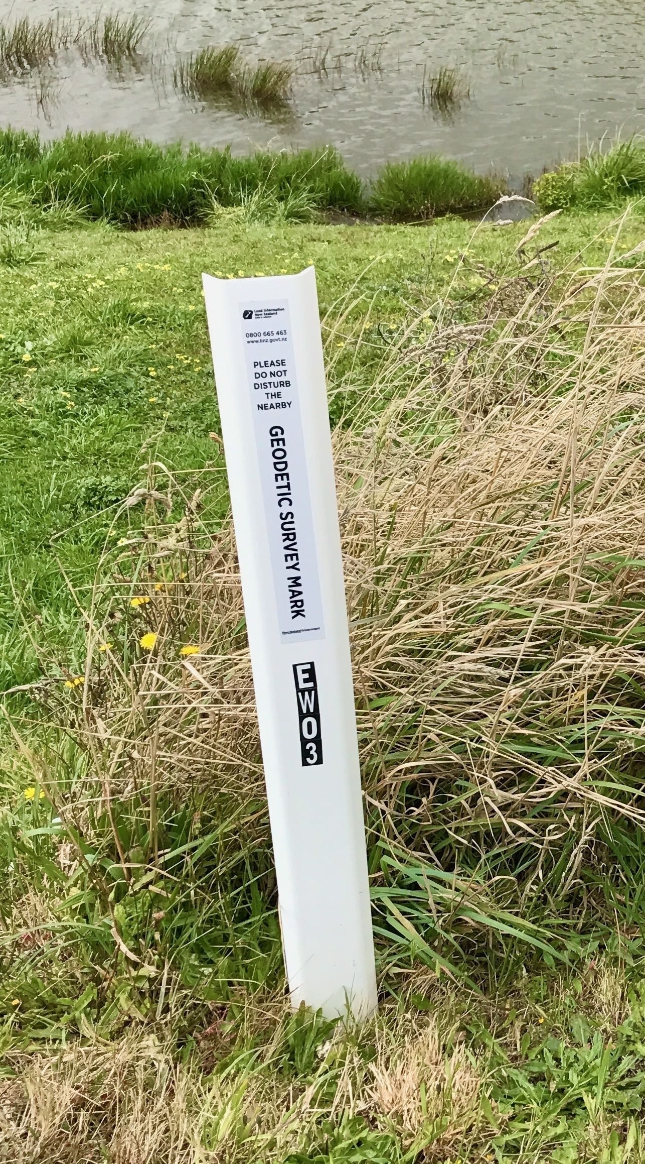 Geodetic survey marker post. 