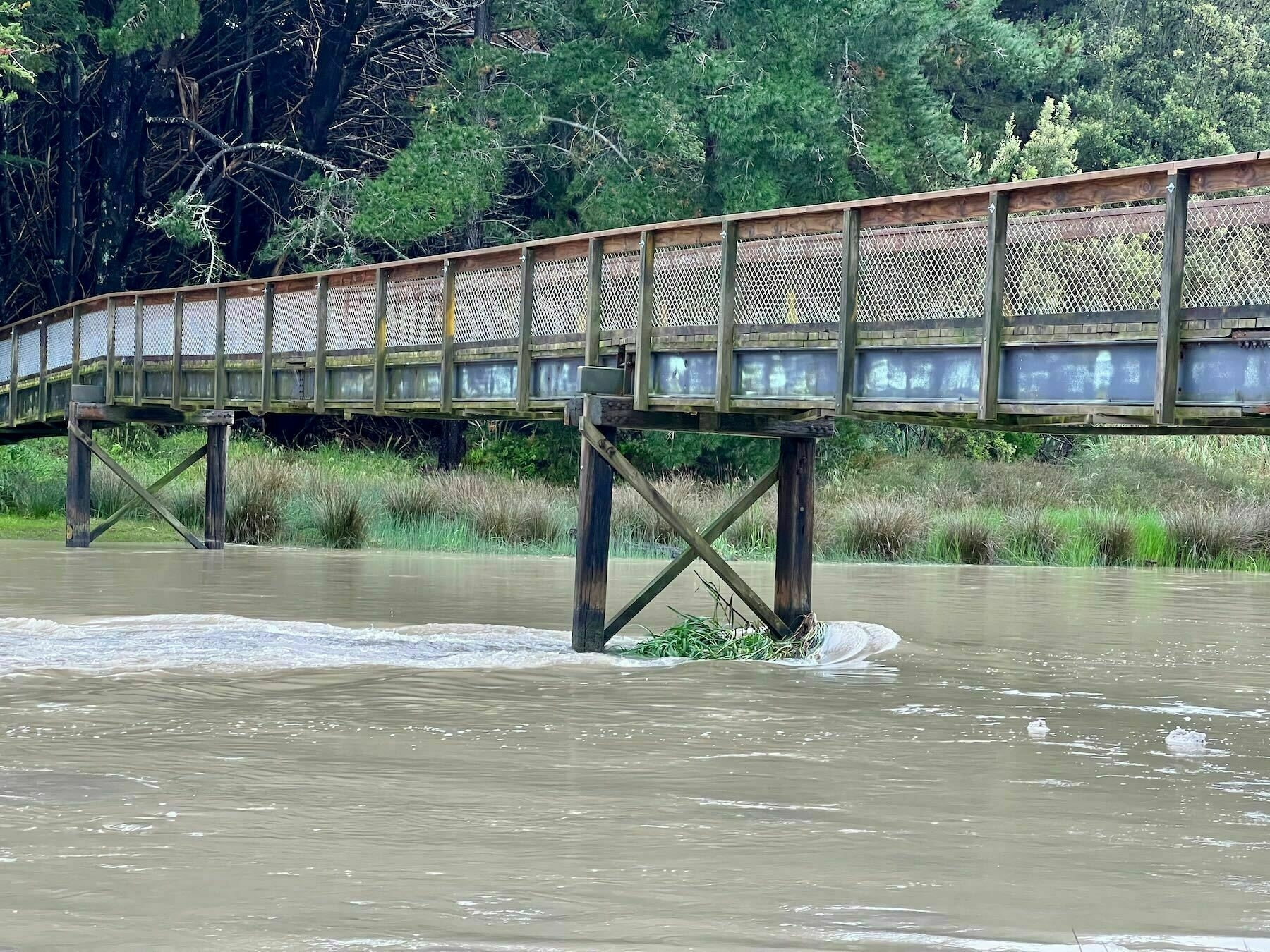 Swift river at the footbridge. 