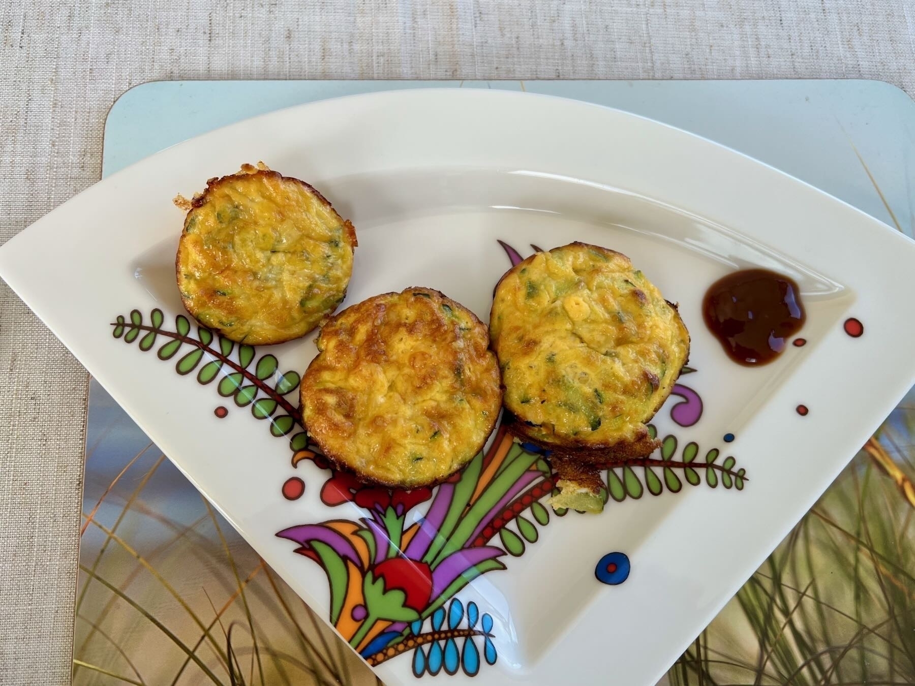 3 small frittatas on a plate. 