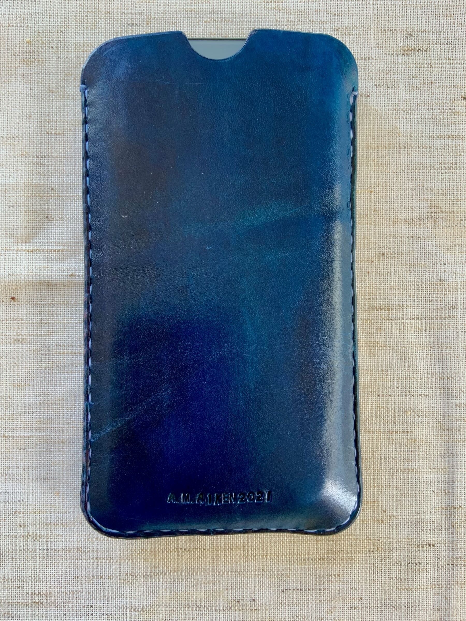 IPhone 13 Pro Max in sleeve. 