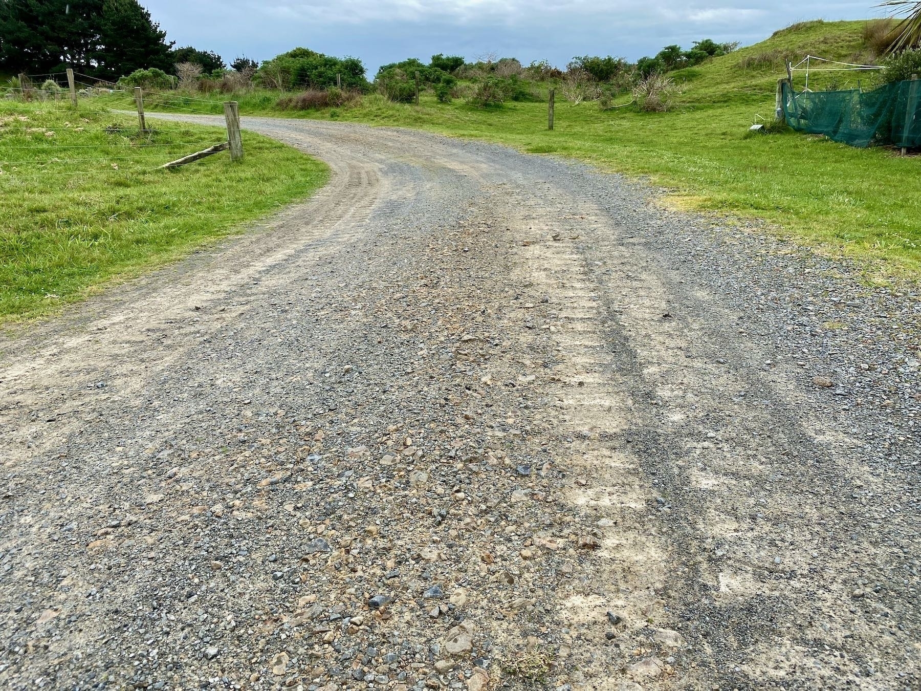 Digger tread marks on the lane surface. 