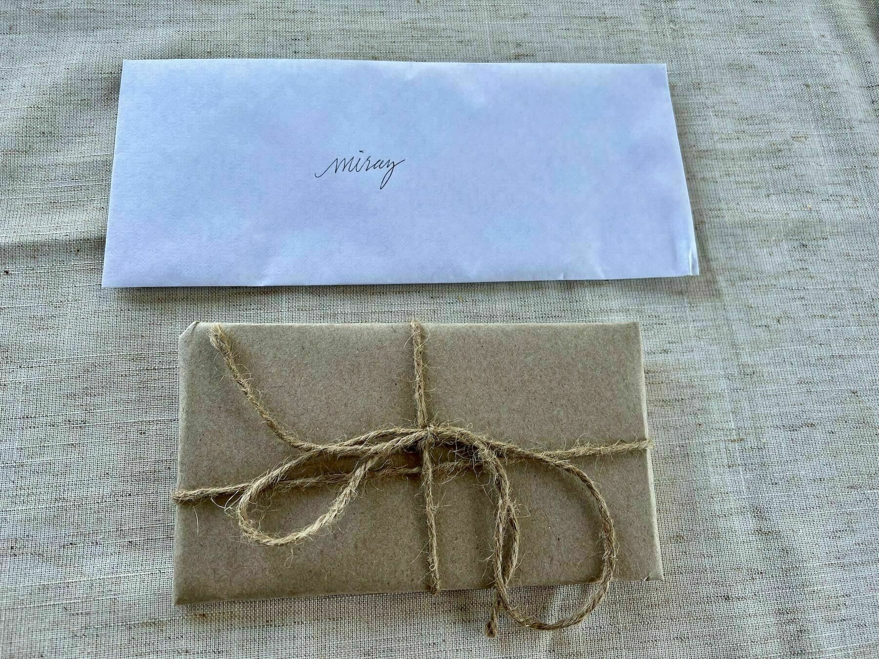 Card and small wrapped package. 