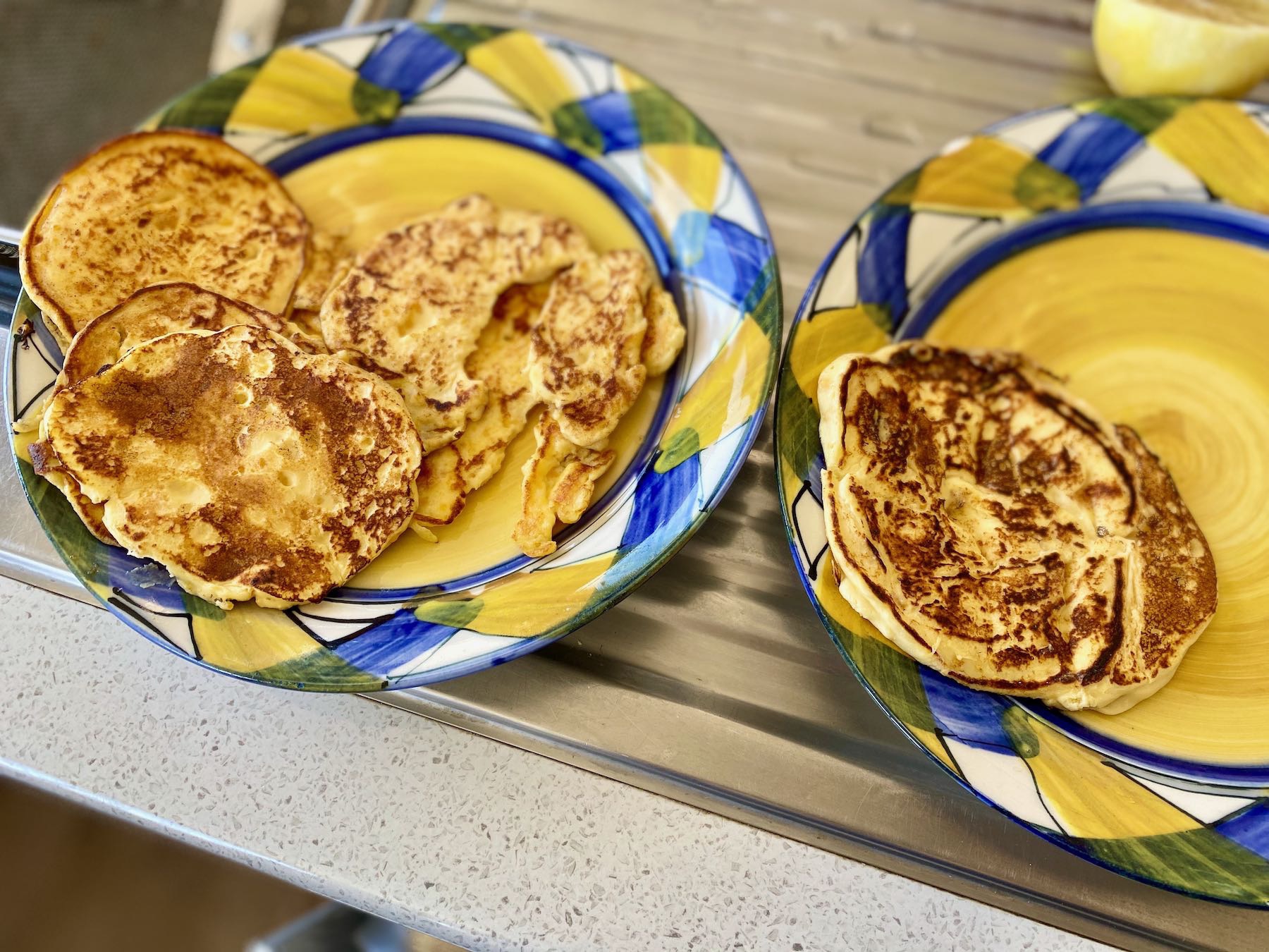 Two plates with pancakes. 