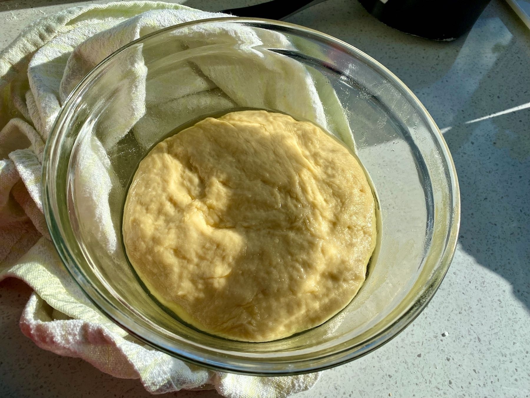 Dough rising in a bowl. 