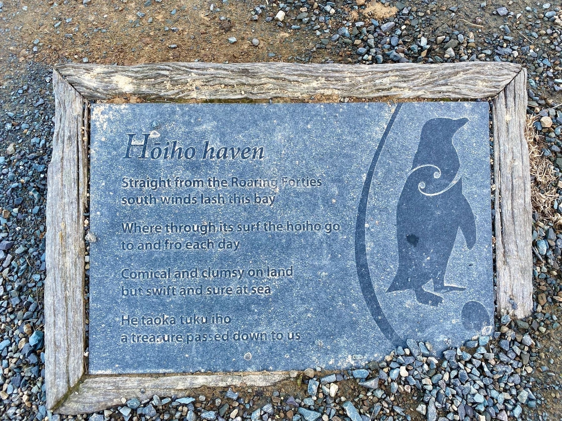 Small poem carved on stone and embedded in the path. 
