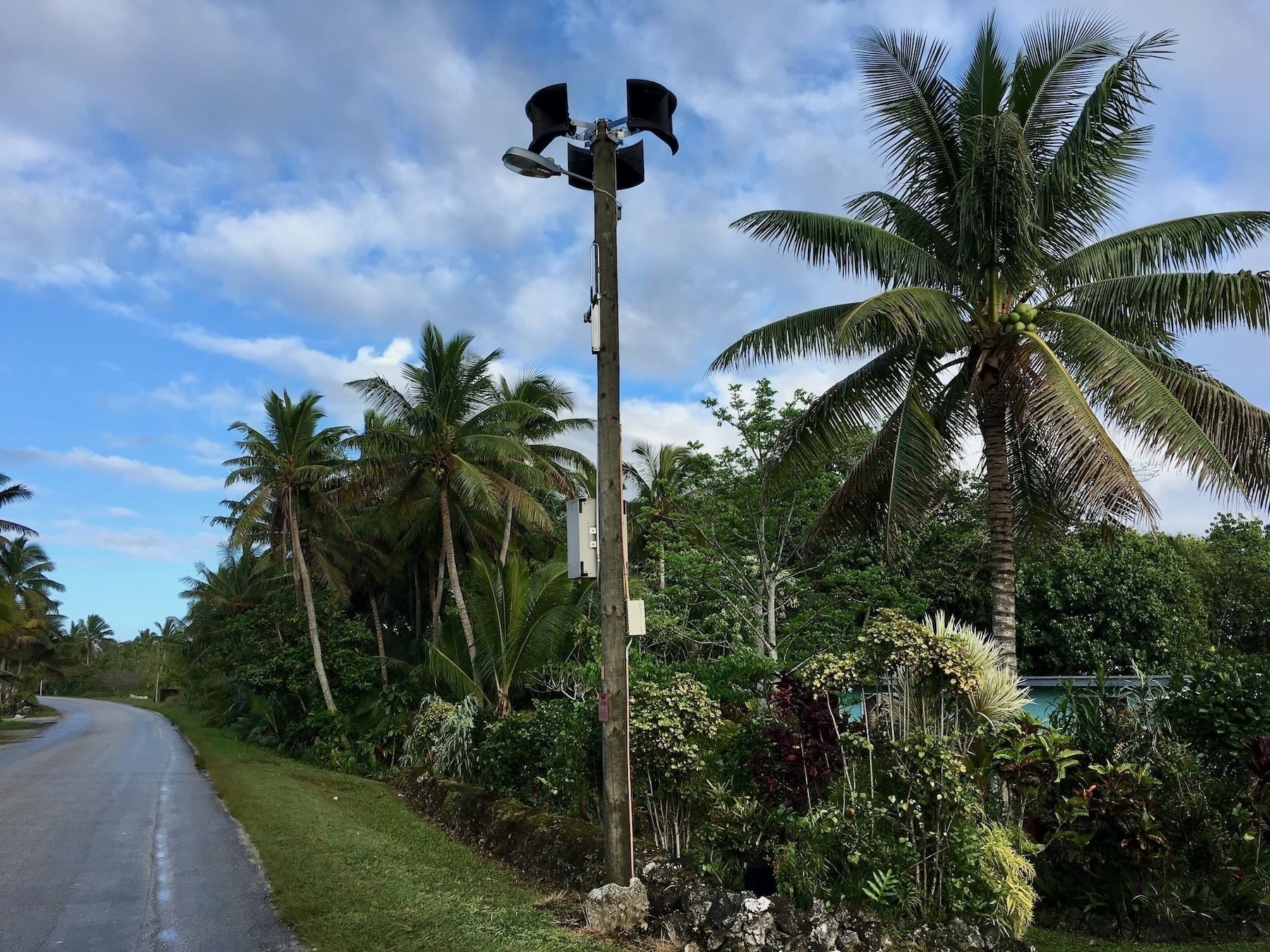 In Niue tsunami siren on a tall pole. 