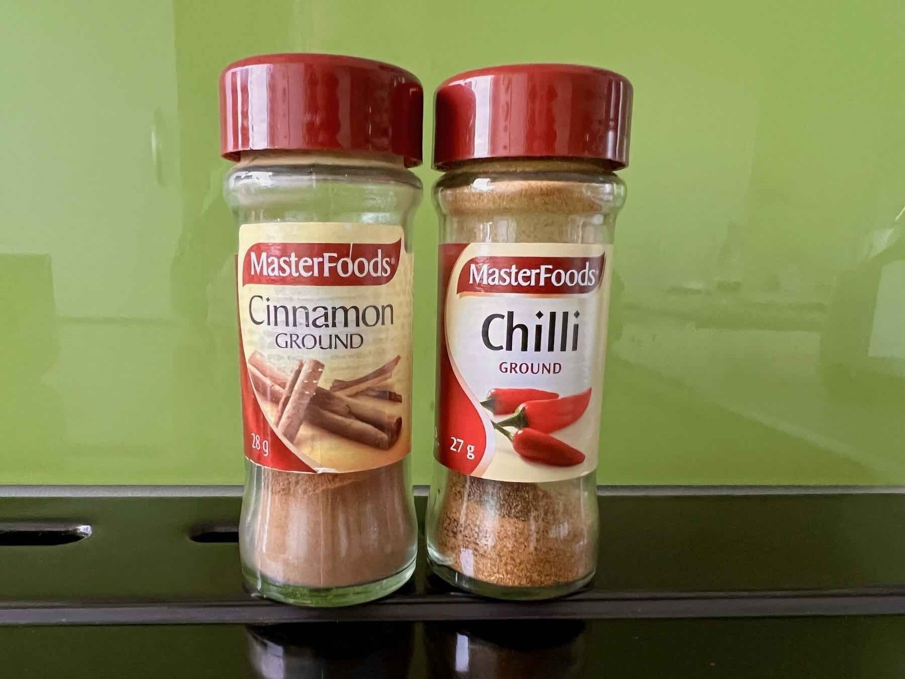 Cinnamon and ground chilli shakers look almost identical. 