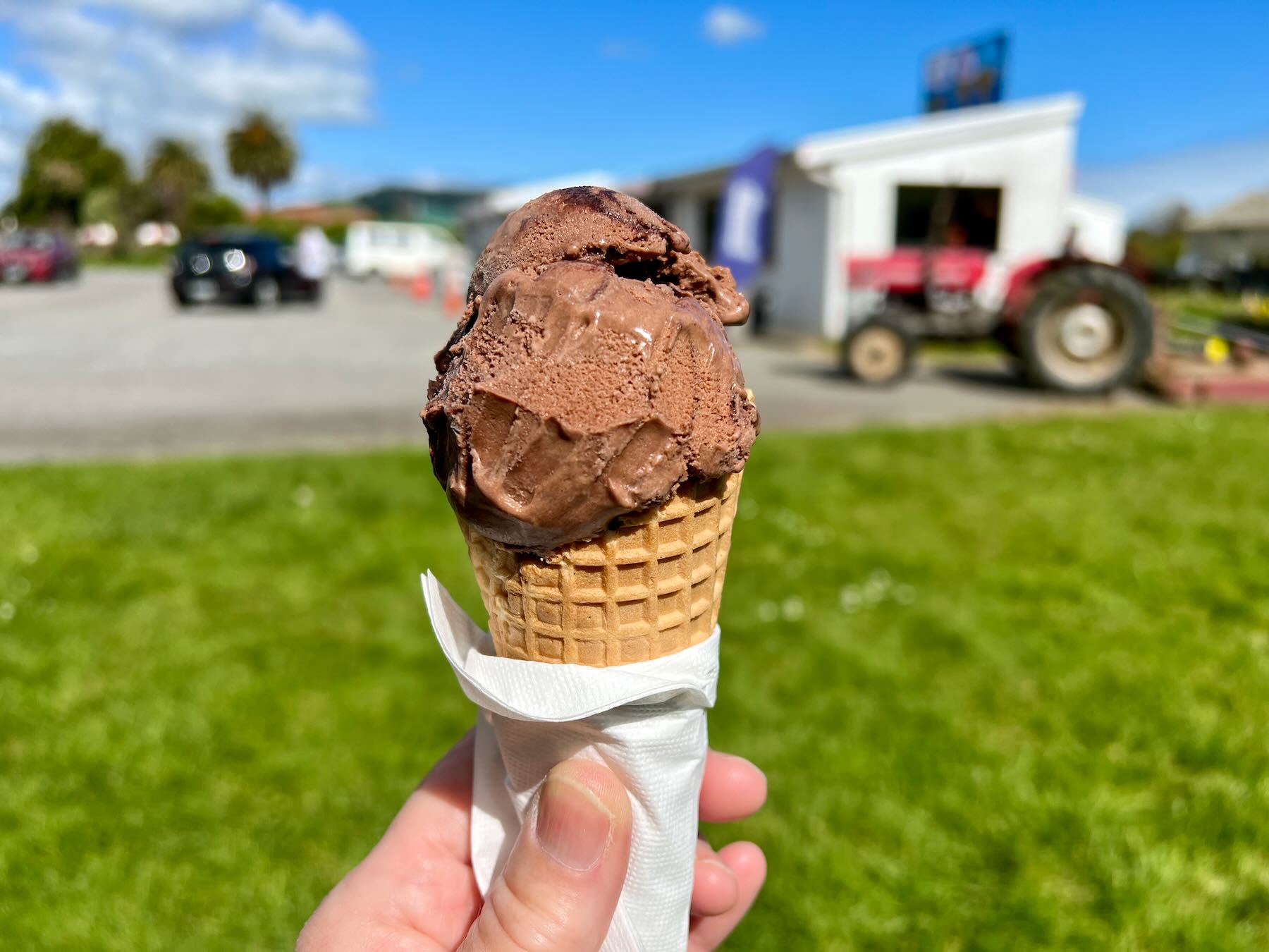 Chocolate ice cream in a cone. 