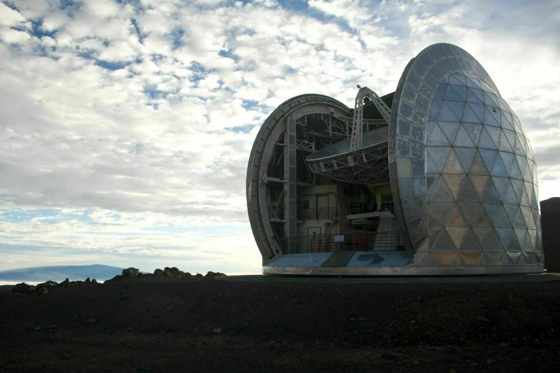 Mauna Kea visit  — an enormous telescope inside an opened dome. 