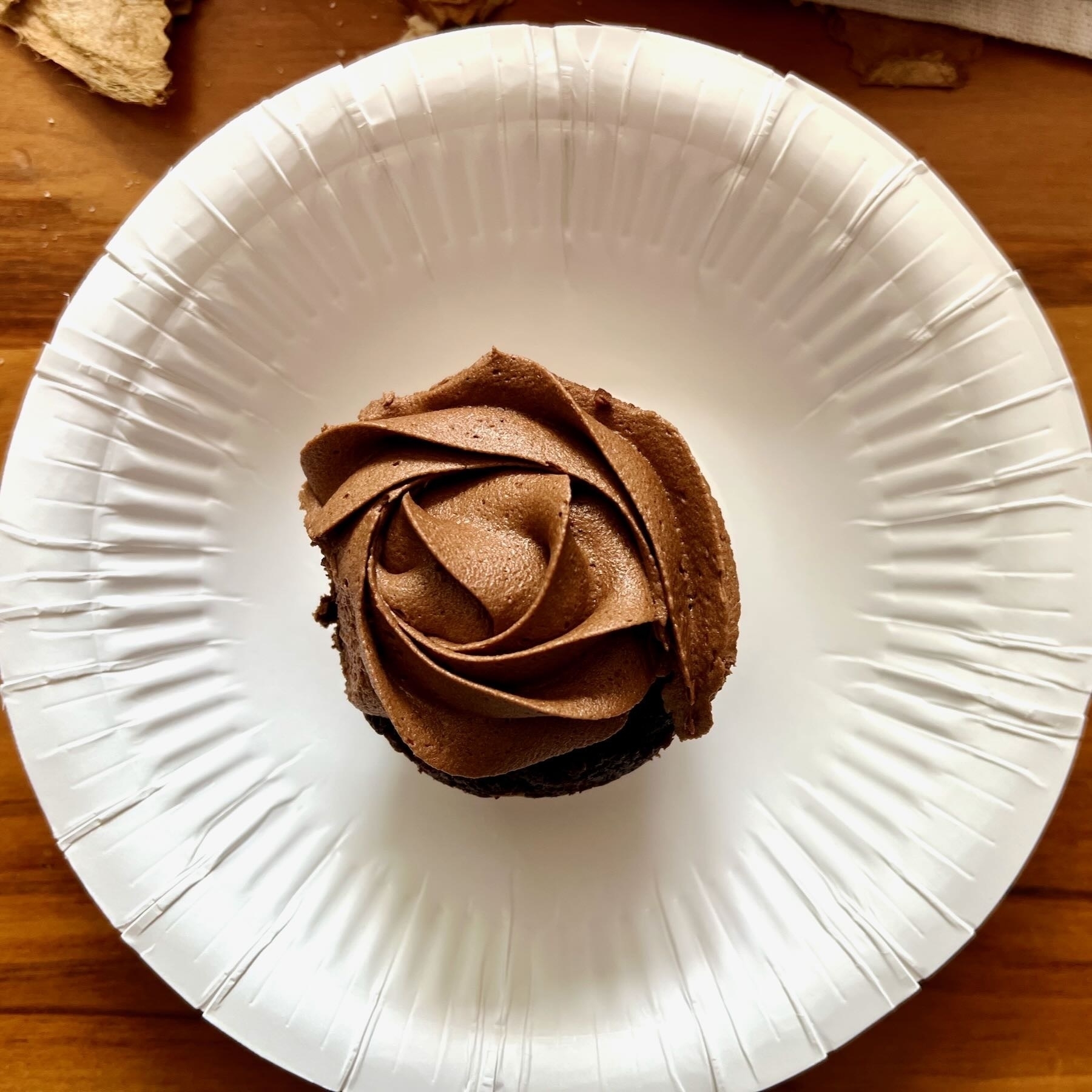 Chocolate cupcake iced like a rose. 