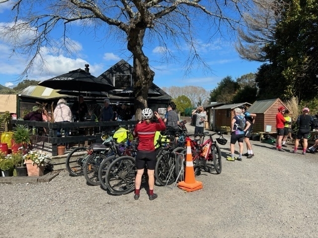 Many bikes outside the cafe. 