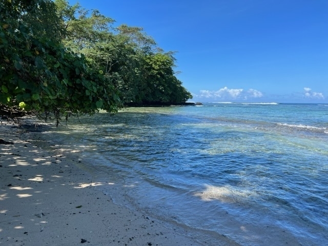 White sand beach, blue sea and sky. 