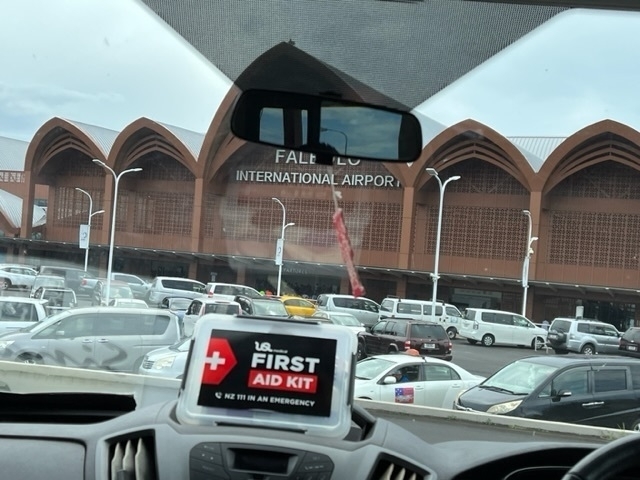 Faleolo Airport building with curvy roof. 