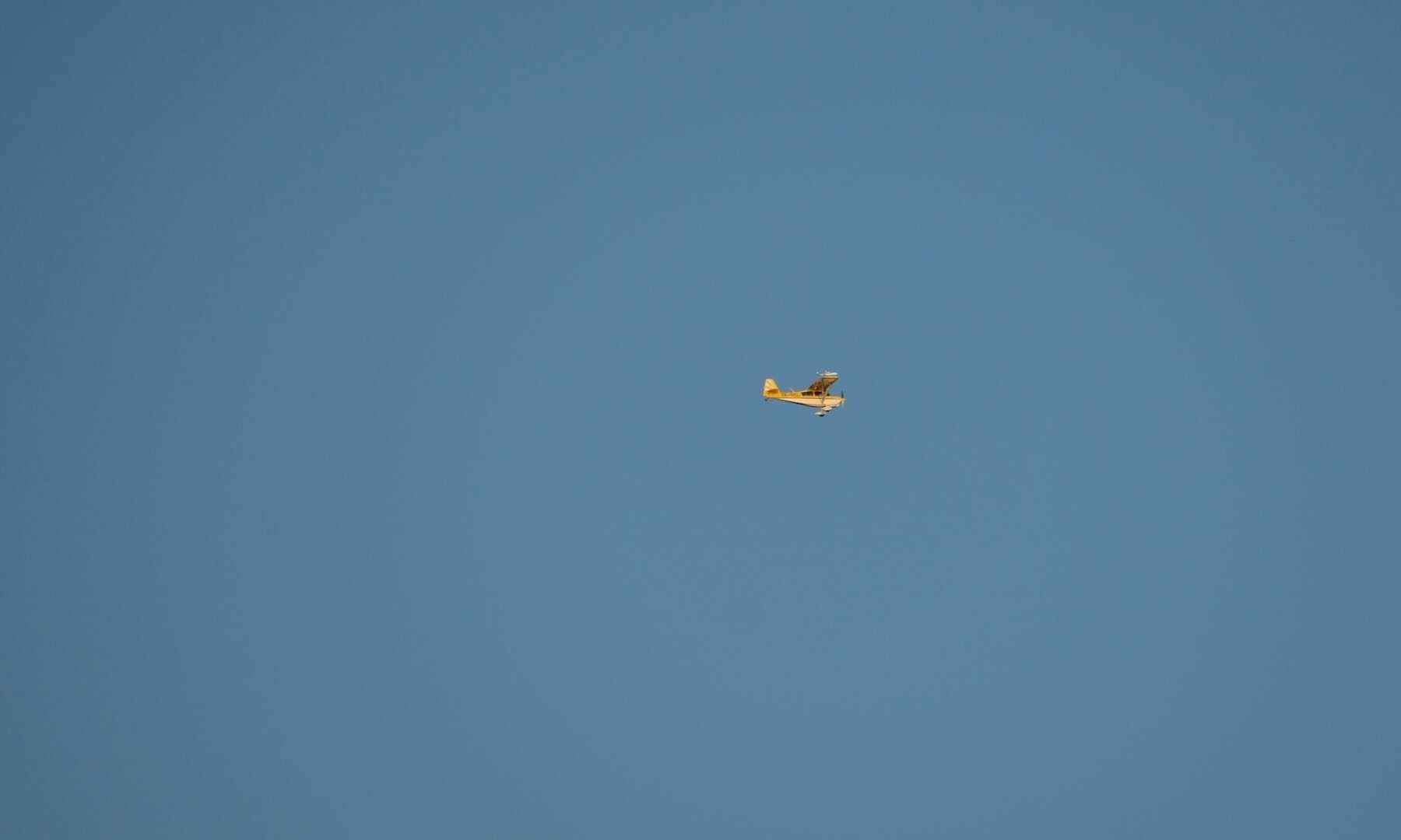 Small plane in late sunshine. 