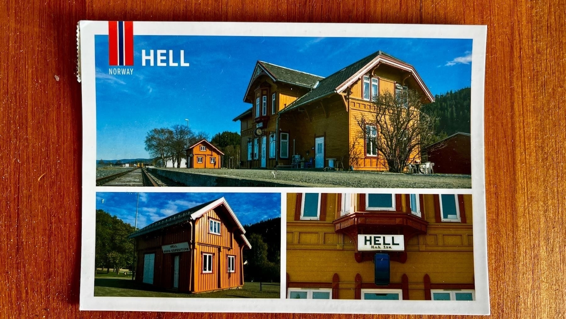 Postcard with photos of small buildings in a town called Hell. 