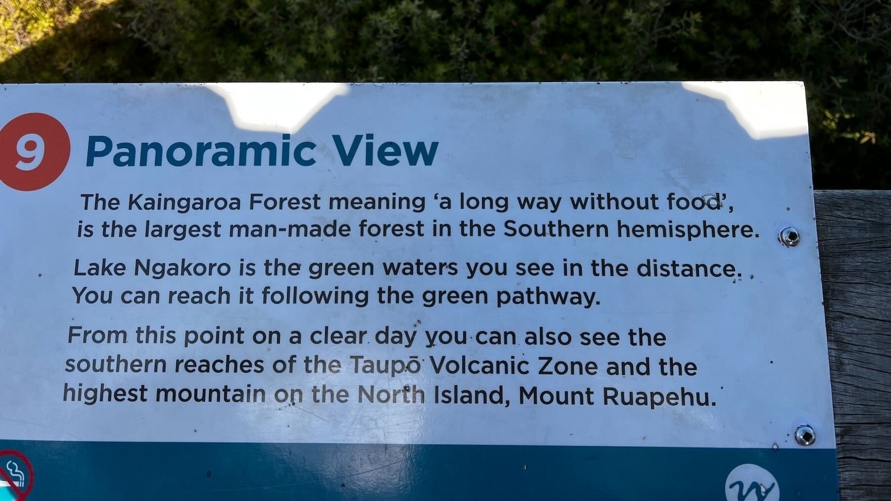 Panoramic view info board mentions Kaingaroa forest and green Lake Ngakoro. 