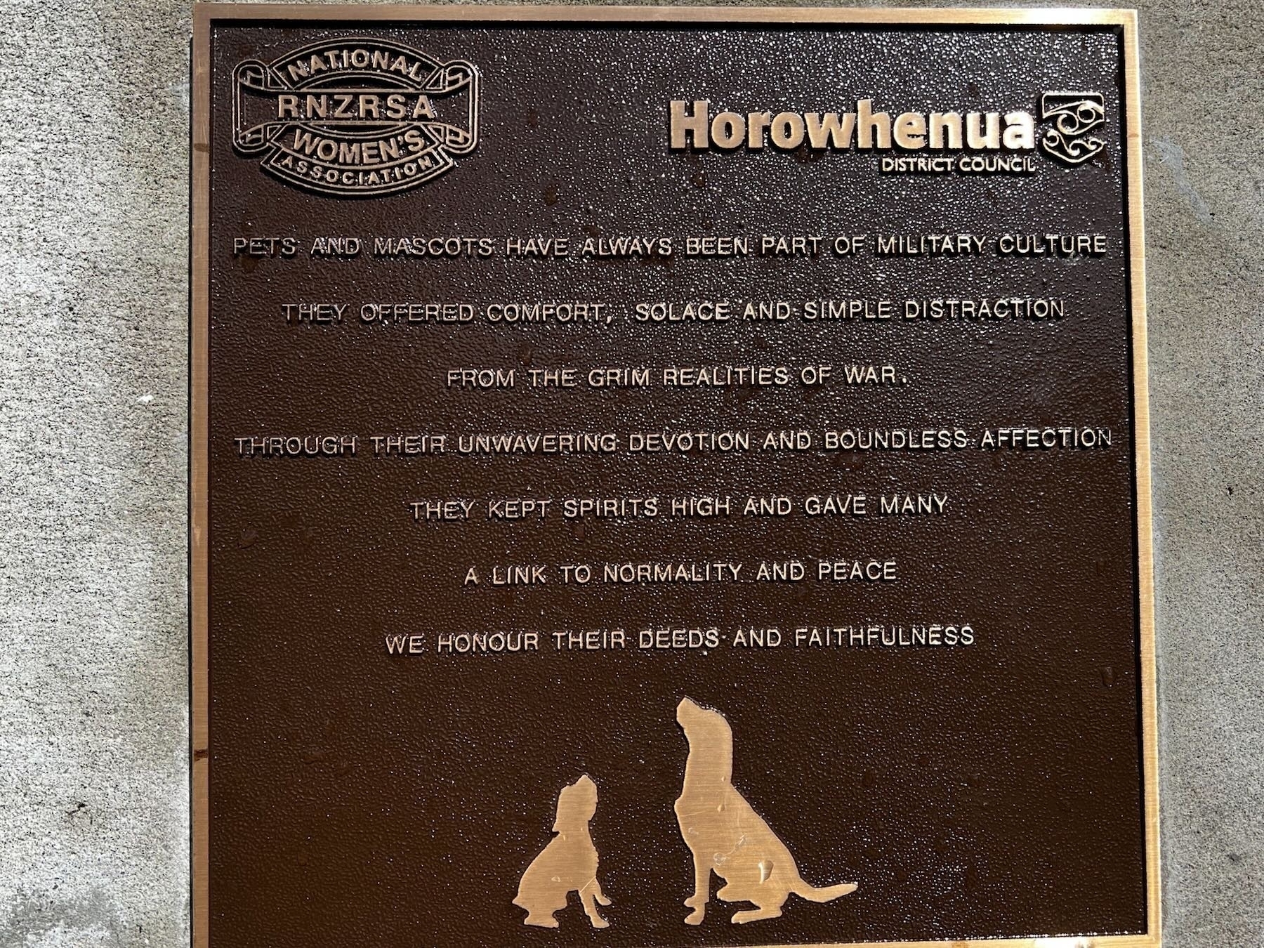 A plaque memorialising the contributions of animals. 