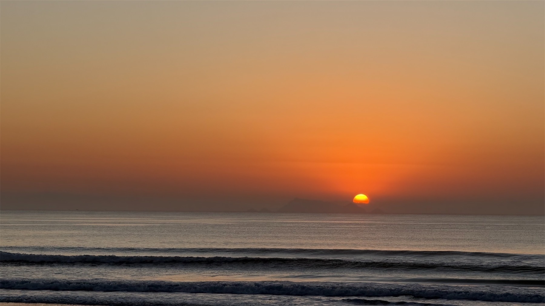 Finally, about half the sun is visible above the horizon. 