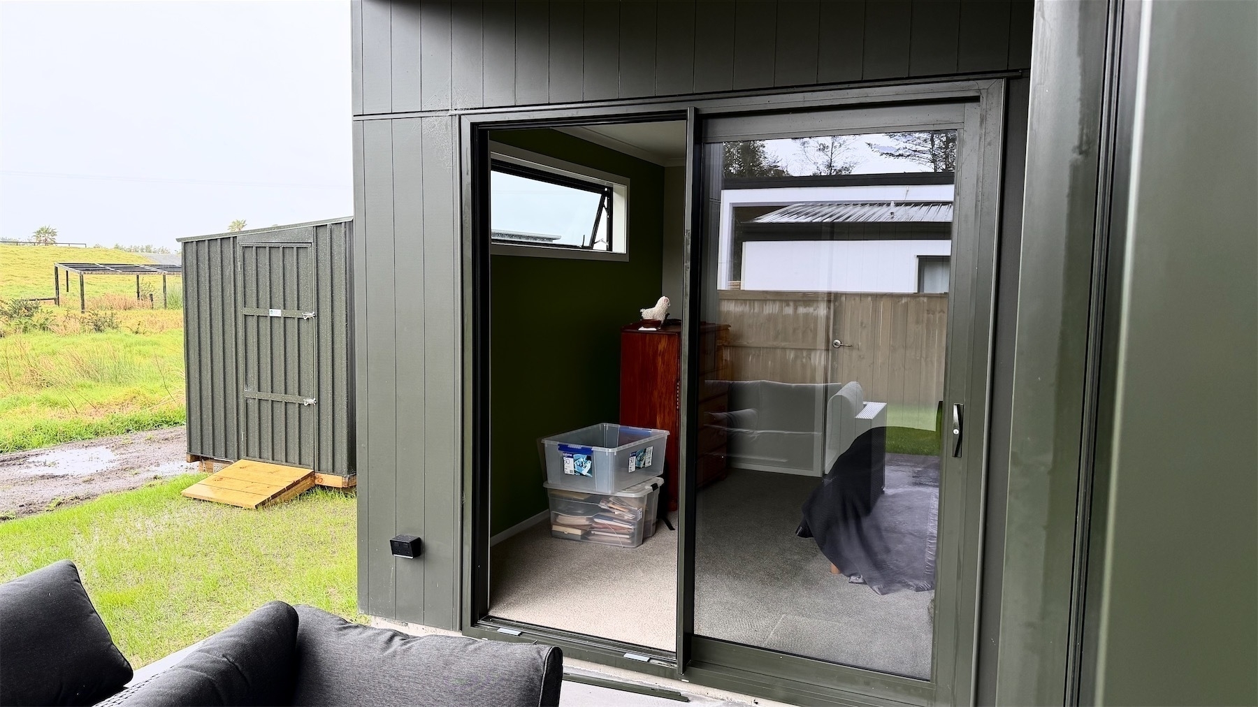 Sliding door with one pane of double-glazing removed. 