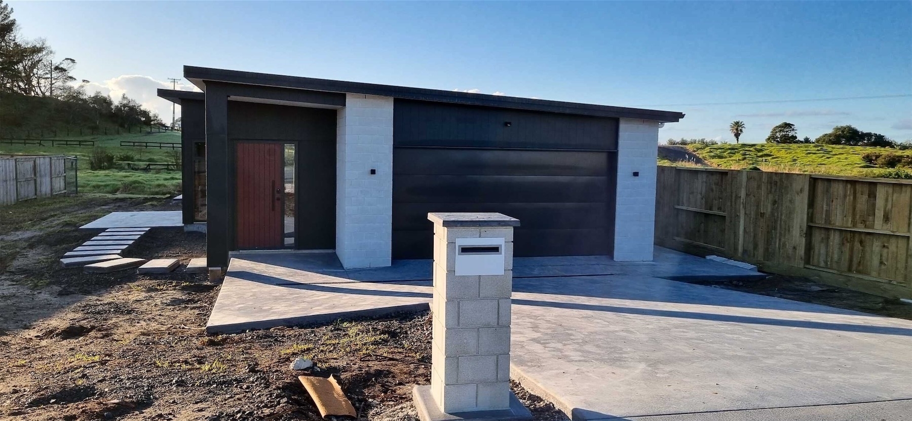 Front of house with fancy letterbox.