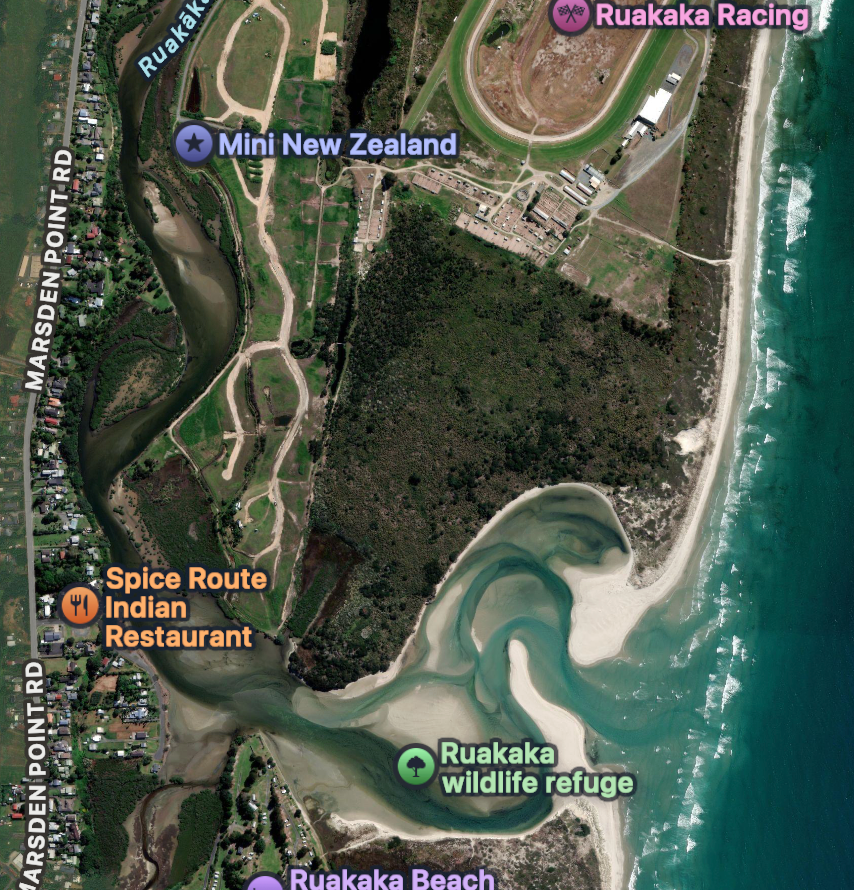 Satellite view on map shows the river mouth.