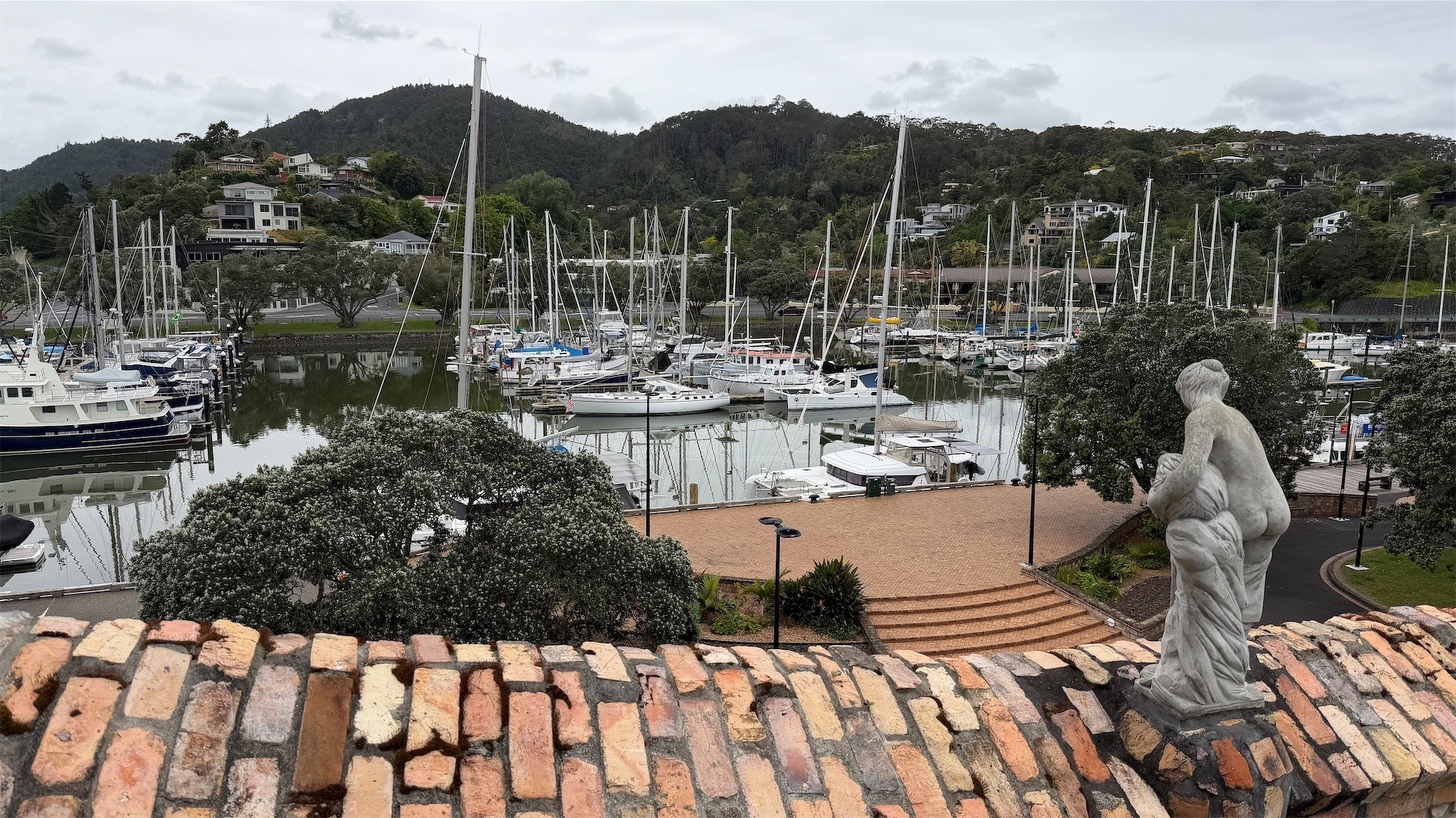 View from the roof to the marina, with statue.