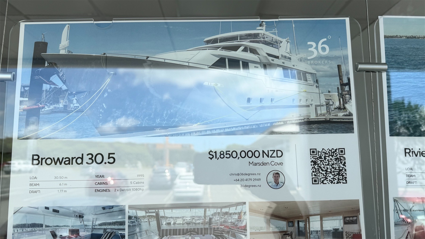 Yacht for sale sign.