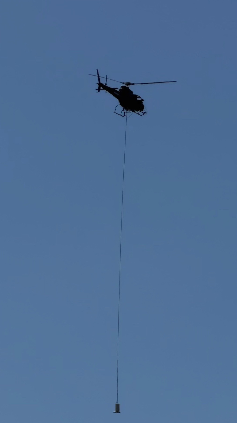 Helicopter with dangling payload.