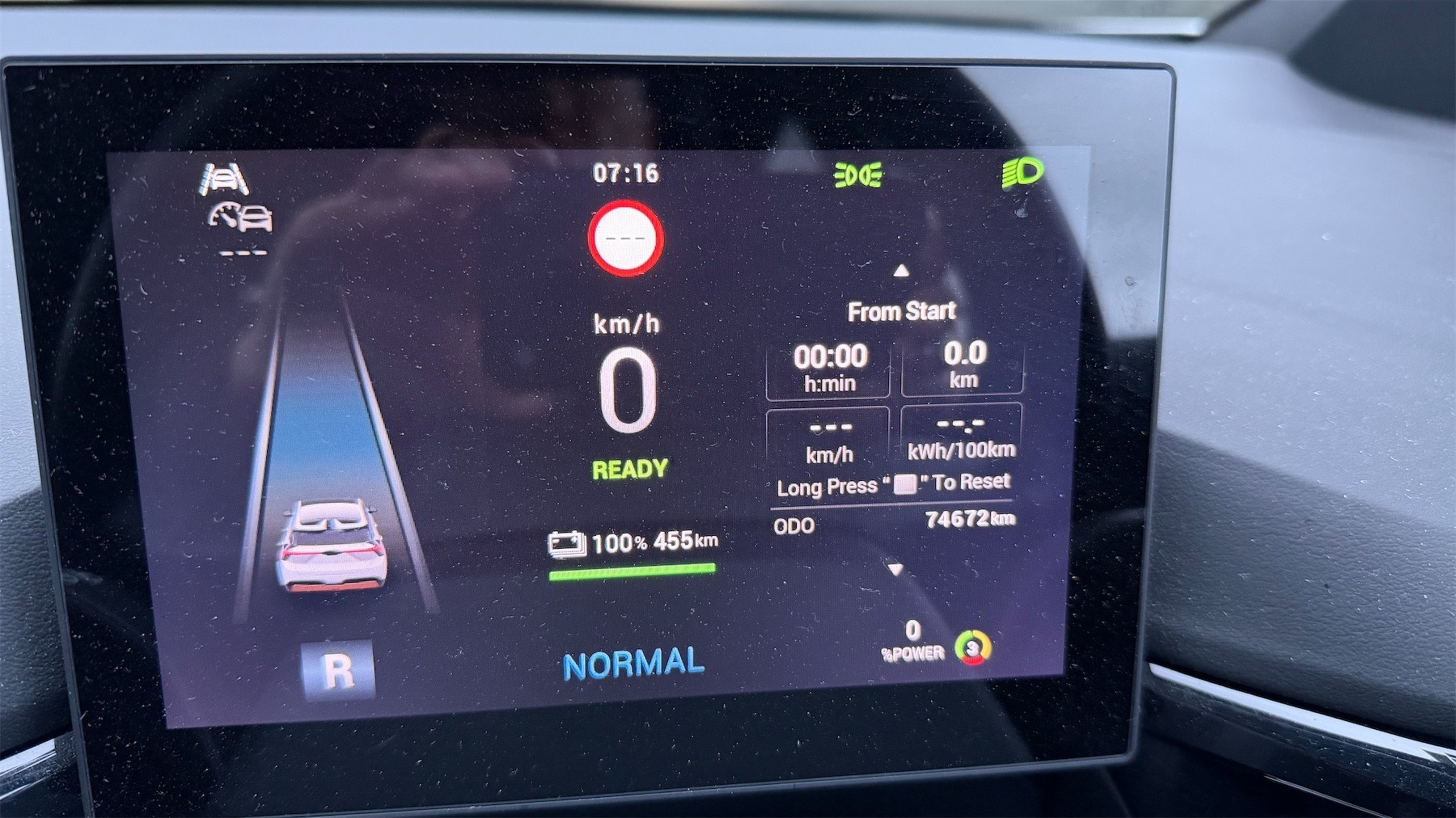 Dash panel on the car estimates we can drive 455 km on a 100% charge.