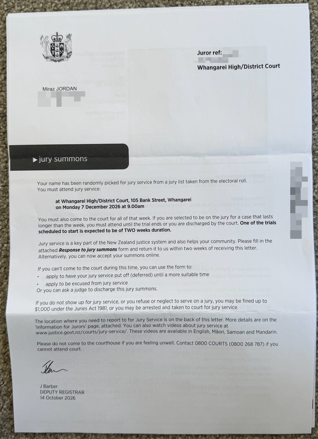 A summons to attend for jury duty in early December.