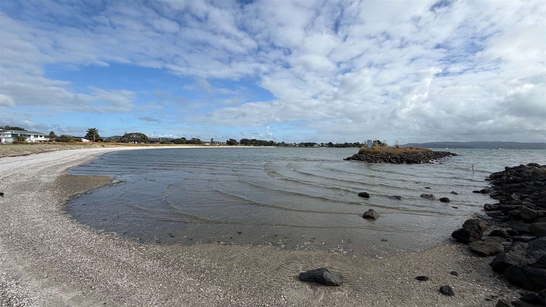 The sweep of a small bay. 