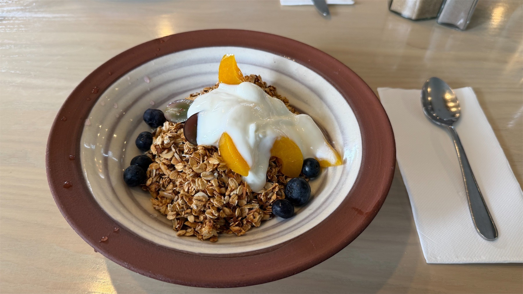 A plate with a very large helping of oats. 