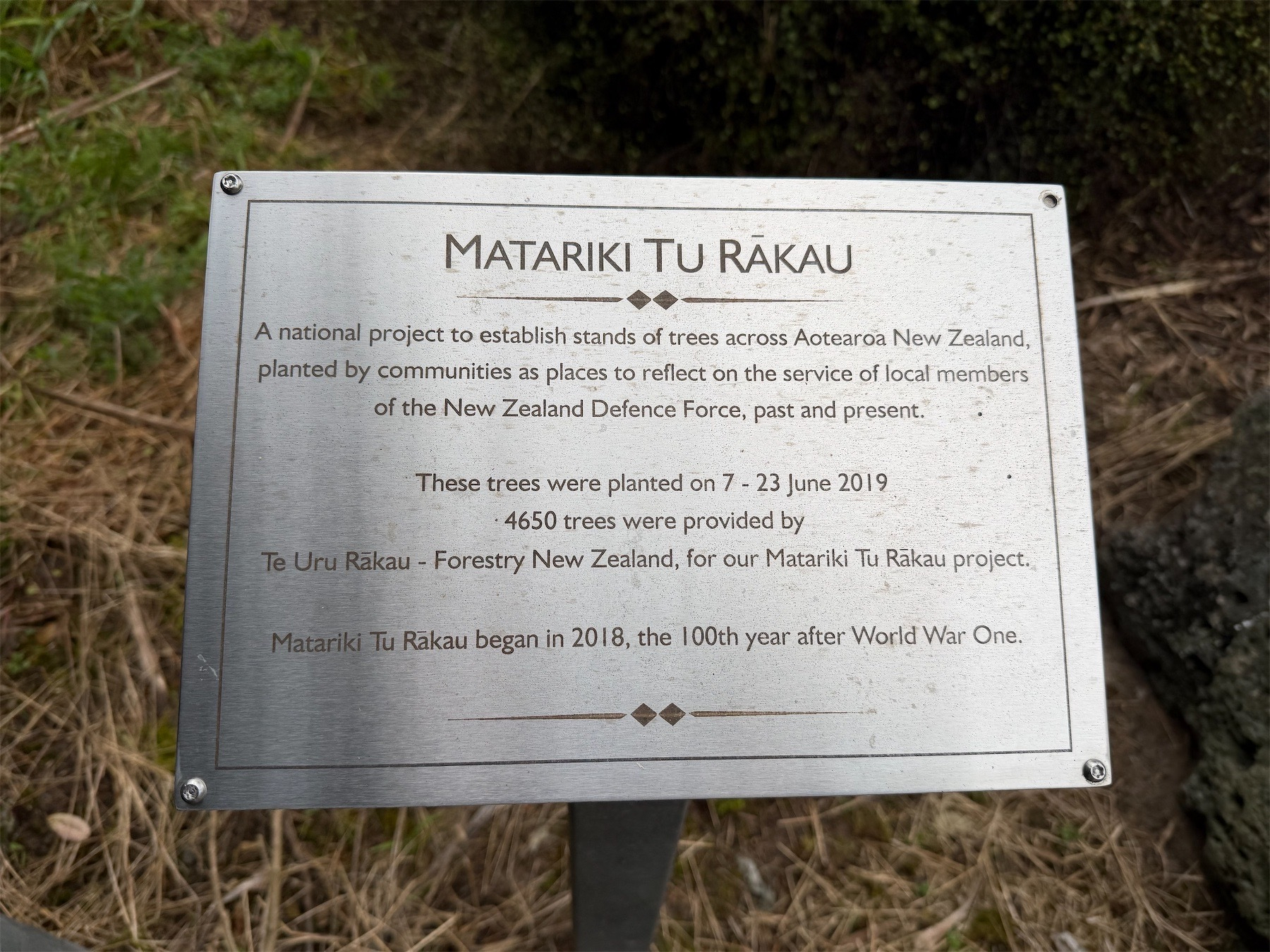 Plaque with details of: A national project to establish stands of trees across Aotearoa New Zealand, planted by communities as places to reflect on the service of local members of the New Zealand Defence Force, past and present.