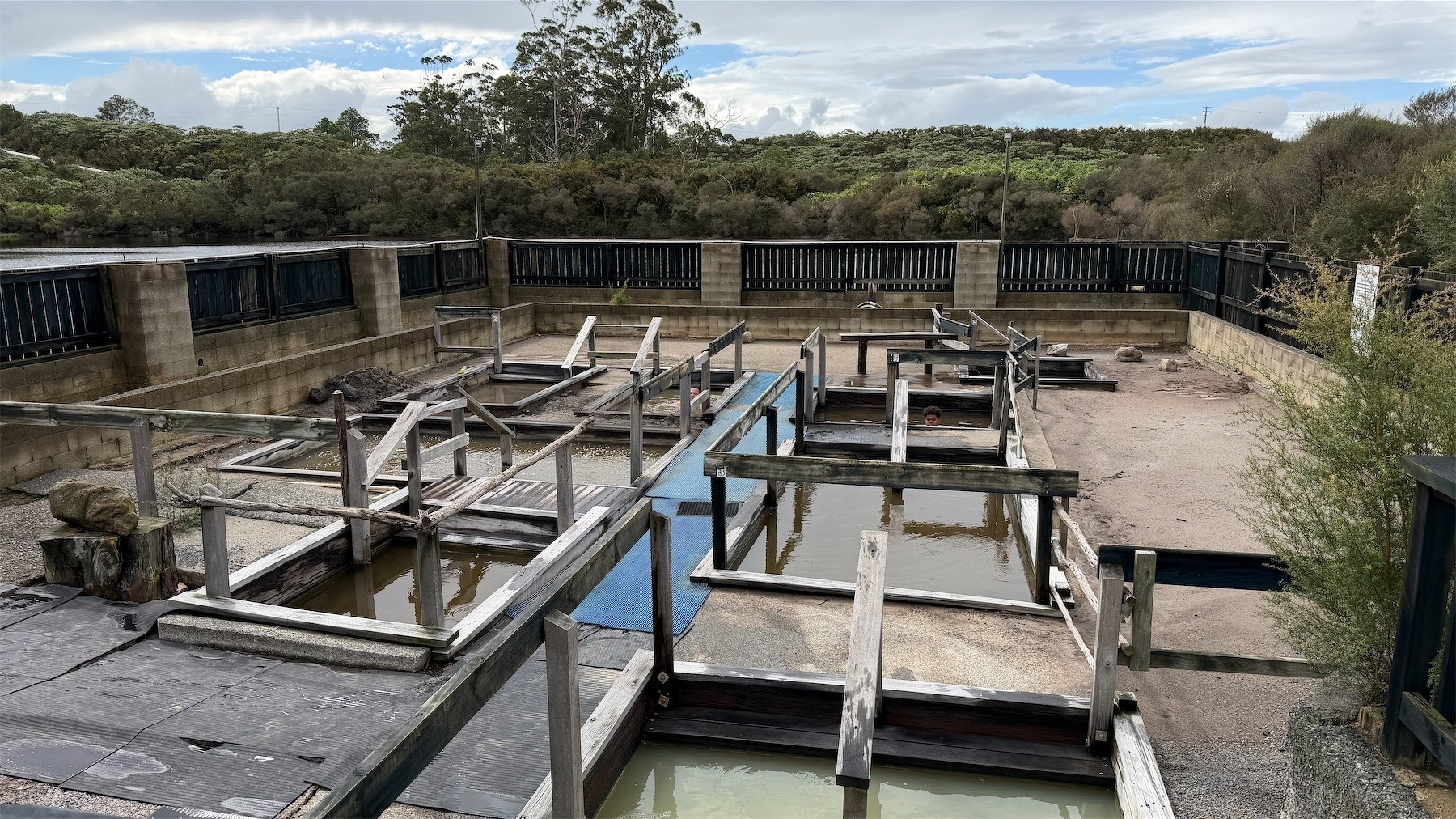 8 small hot pools within an enclosed area. It's very rustic.
