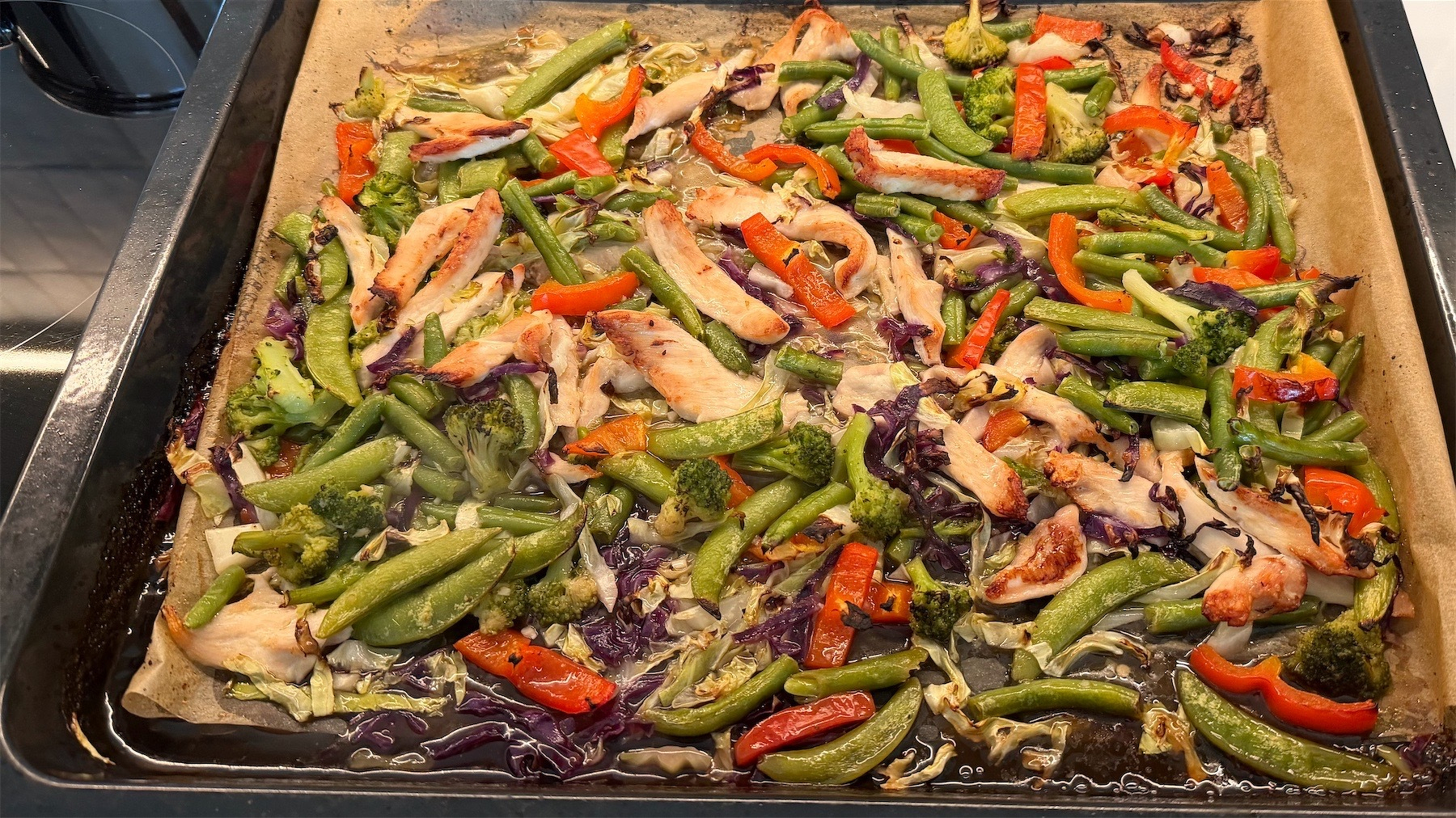 Chicken Teriyaki Stir-Fry Traybake in a baking tray.