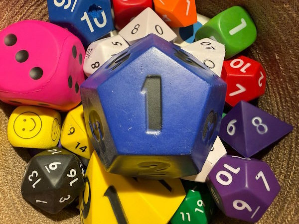 A pile of multi-colored gaming dice