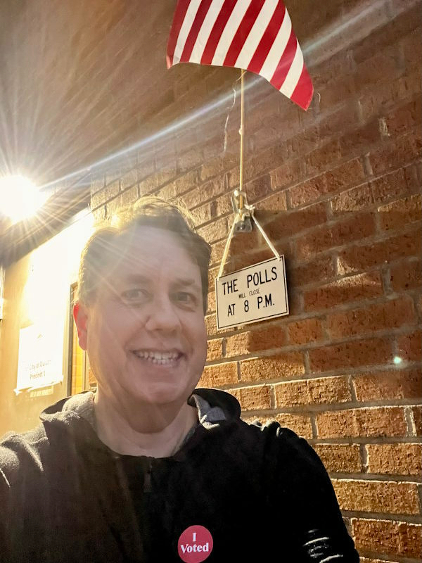 Outside the polling place with my voting sticker