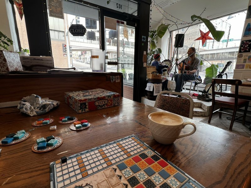 Coffee and board games at a cafe with live music