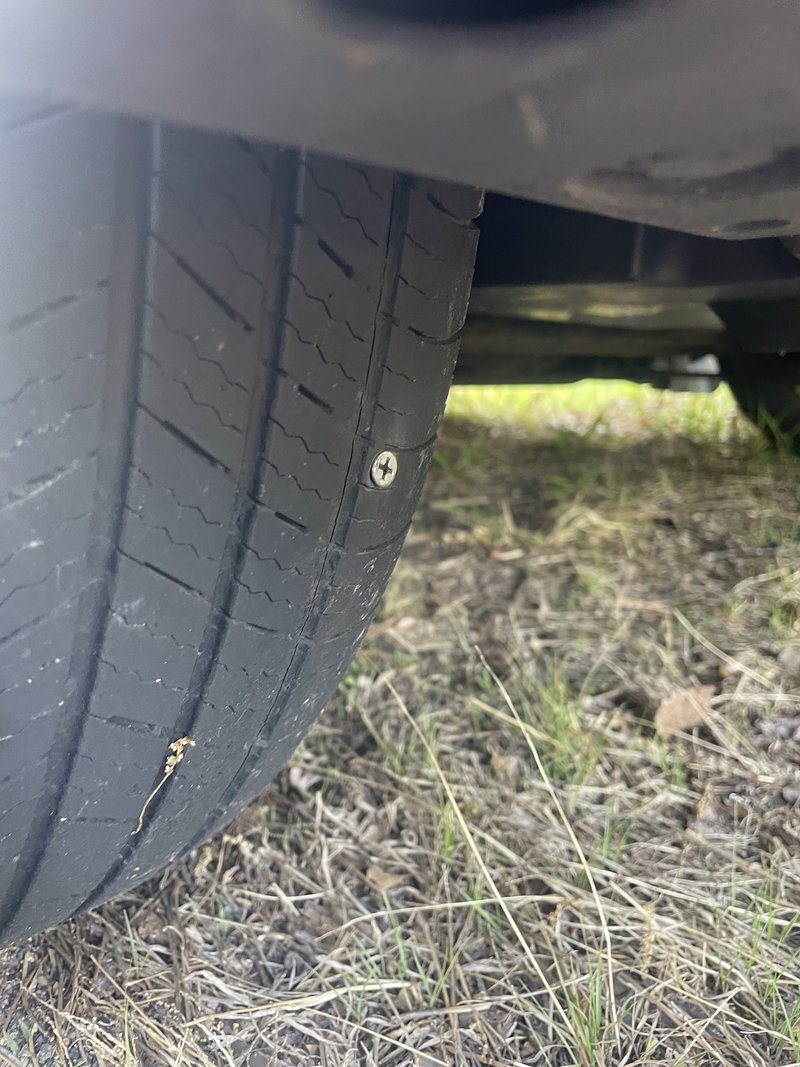 Kaylee's flat tire on the drive back from my parents' place