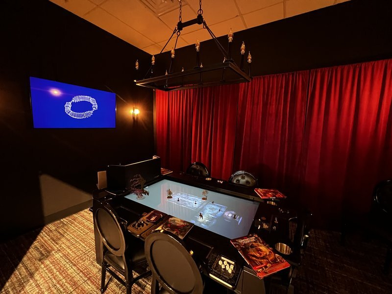 The rentable gaming room with a touchscreen table at BigBadGameStore