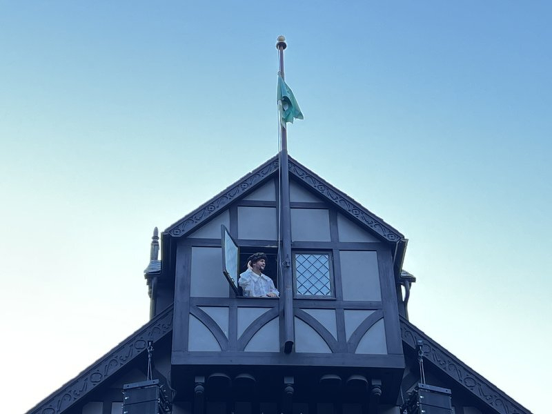 A trumpeter and the flag above the Allen Elizabethan Theatre at the Oregon Shakespeare Festival