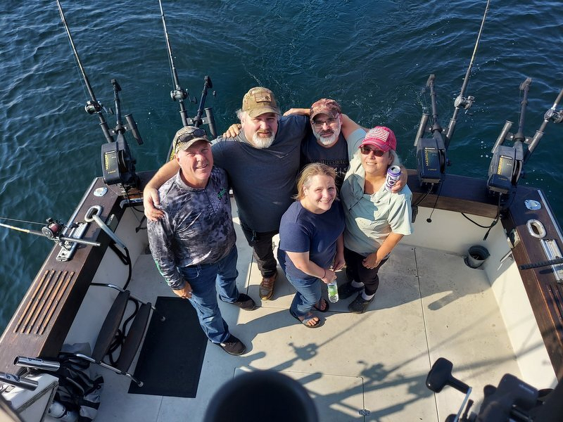Jody and her siblings gathered on the deck of the charter boat on Lake Superior